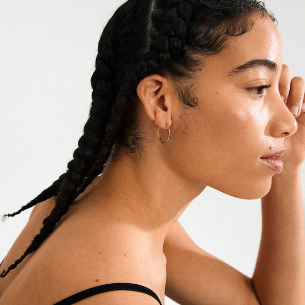 Between eyrnalokkar - gylltir