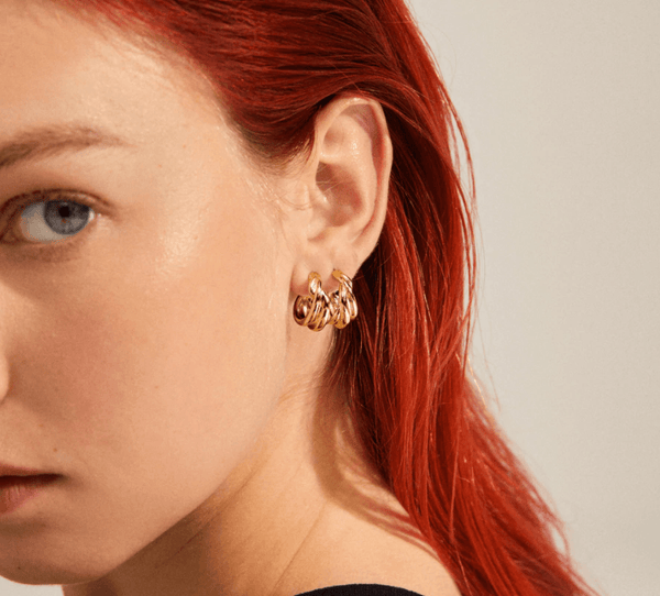 Courageous Twirl Huggie Hoop Earring Gold